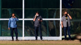 Brazil's President Bolsonaro bitten by ostrich-like bird during coronavirus quarantine: local media