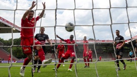 German club plans mass virus testing to fill stadium again