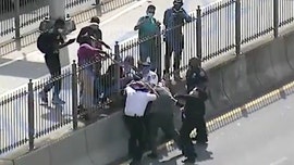 NYPD seeks man who attacked police with wooden object during Brooklyn Bridge protest