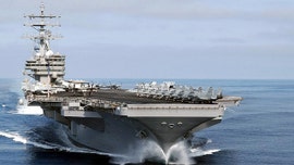 US Navy carriers steam near Iranian coast in show of power