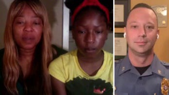 Out-of-work mom gifts lottery winnings to officer shot in the line of duty because of daughter's 'selfless' suggestion