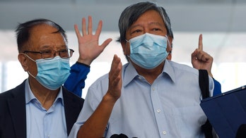 Hong Kong bars pro-democracy candidates from election, signals intent to uphold new China law