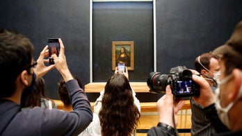 Louvre Museum reopens after 4-month coronavirus closure