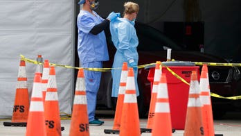 As coronavirus cases surge, doctors and nurses fear shortage of PPE