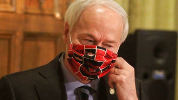 Coronavirus: Arkansas, Colorado mandate face coverings to fight surge