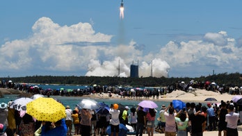 China successfully launches mission to land rover on Mars