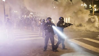 Fireworks, then tear gas: Night 62 in Portland sees more clashes; Trump in talks to pull out federal officers