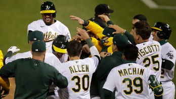 A's slam Angels in first MLB game with new extra-inning rule