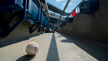 Phillies visiting clubhouse staffer tests positive for virus