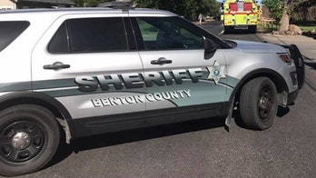 Washington suspect caught after falling through ceiling, fighting with officers, police say