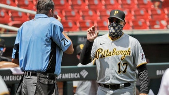 Pirates' Derek Shelton, umpire argue over ejection but make sure their faces were covered