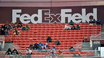 FedEx threatens to remove signage from Redskins stadium unless team changes name: report