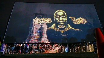 George Floyd hologram projected in front of Robert E. Lee statue in Virginia