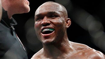 Kamaru Usman retains welterweight title after overpowering victory over Jorge Masvidal at UFC 251