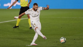 Madrid beats Alavés 2-0 for 8th straight win in title march