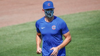 No high-fives? No spitting? MLBers adjust in COVID world