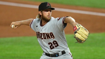 Arizona's Merrill Kelly loses no-hit bid in 7th at Texas