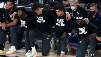 NBA's Adam Silver supports players kneeling during national anthem, won't enforce league rule on standing