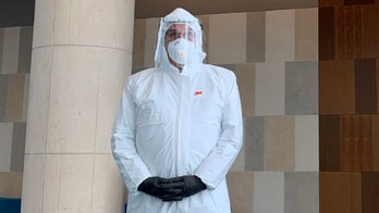 Florida lawyer wears hazmat suit to court amid coronavirus spike