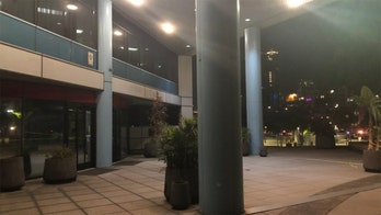 San Diego police shoot man they say slipped out of handcuffs, grabbed officer's spare gun