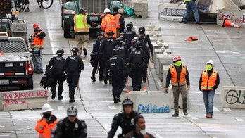 Seattle police arrest 10 after clashes in cleared CHOP zone