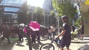 Seattle police release bodycam footage of protesters throwing projectiles at them