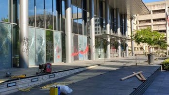 Seattle rioters seen damaging, looting stores; 2 arrests, 12 cops injured