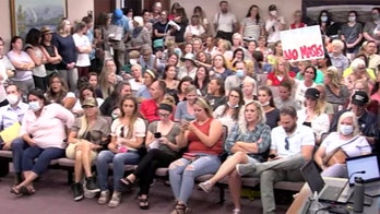 Anti-mask crowd fills Utah County meeting on mask mandate exemption request; meeting rescheduled due to health concerns