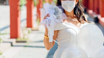 Brides are now wearing designer masks to match their dresses