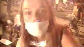 Woman in controversial NYPD arrest seen in newly released video apparently damaging cameras 5 times