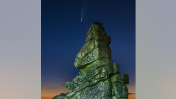 NEOWISE comet spotted flying over 1,800-foot Manstone Rock in England