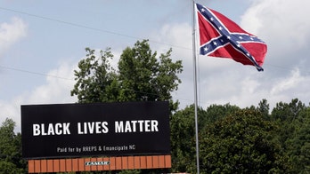 'Black Lives Matter' put on billboard beside Confederate flag in protest