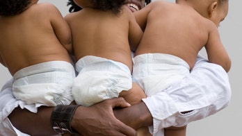 Dad struggles to keep up with triplets as they raid the fridge in hilarious video