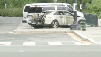 Supreme Court police vehicle set ablaze, 1 person in custody