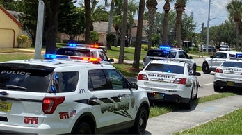 3 dead, officer injured, in neighborhood dispute sparked by dangerous dog