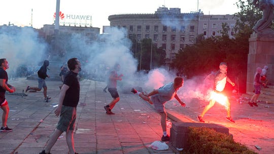 Serbia to scrap curfew plan after violent protests, imposes ban on large gatherings instead