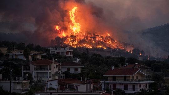 Wildfire in Greece forces evacuations, firefighters race to stop blaze