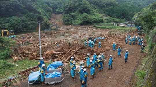 Japan floods leave up to 34 dead, many at nursing homes
