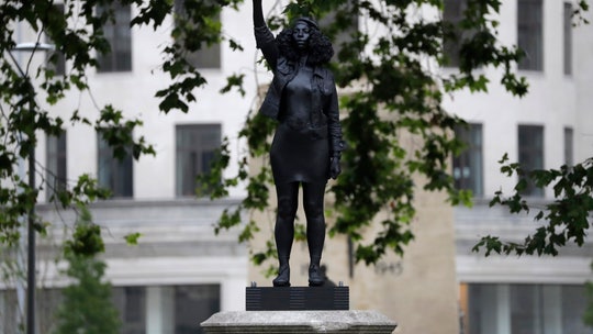 Toppled UK statue of slave trader quietly replaced with sculpture of Black Lives Matter protester