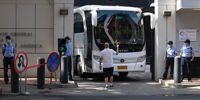 A movers' truck with the words "Liberation" on top arrives outside the United States Consulate in Chengdu in southwest China's Sichuan province on Sunday, July 26, 2020. China ordered the United States on Friday to close its consulate in the western city of Chengdu, ratcheting up a diplomatic conflict at a time when relations have sunk to their lowest level in decades.