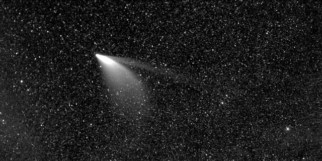 Processed data from the WISPR instrument on NASA's Parker Solar Probe shows more detailed information about the double tails of the comet NEOWISE, as seen on July 5, 2020. The lower, wider tail is the dust tail of the comet, while the thinner, upper tail of the comet is the ion tail. (Credits: NASA / Johns Hopkins APL / Marine Research Laboratory / Parker Solar Probe / Guillermo Stenborg)
