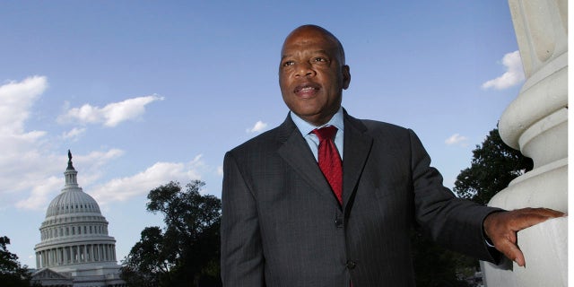 In this Wednesday, Oct. 10, 2007, file photo, with the Capitol Dome in the background, U.S. Rep. John Lewis, D-Ga., is seen on Capitol Hill in Washington. Lewis, who carried the struggle against racial discrimination from Southern battlegrounds of the 1960s to the halls of Congress, died Friday, July 17, 2020. 