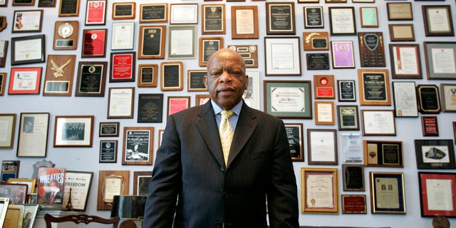In this Thursday, May 10, 2007 file photo, U.S. Rep. John Lewis, R-Ga., in his office on Capitol Hill, in Washington. Lewis, who carried the struggle against racial discrimination from Southern battlegrounds of the 1960s to the halls of Congress, died Friday, July 17, 2020. 