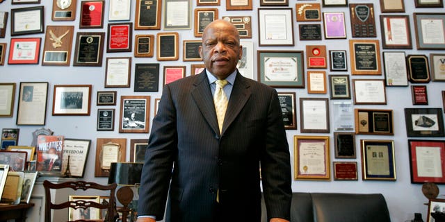 In this Thursday, May 10, 2007 file photo, U.S. Rep. John Lewis, R-Ga., in his office on Capitol Hill, in Washington. Lewis, who carried the struggle against racial discrimination from Southern battlegrounds of the 1960s to the halls of Congress, died Friday, July 17, 2020. 