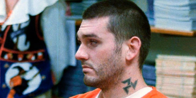 In this Oct. 31 1997, file photo, Daniel Lewis Lee waits for his arraignment hearing for murder in the Pope County Detention Center in Russellville, Ark. (Dan Pierce/The Courier via AP, File)