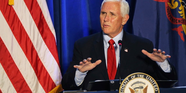 Vice President Mike Pence speaks during a roundtable discussion on reopening the economy at Rajant Corporation, which makes wireless communication systems, in Malvern, Pa., Thursday, July 9, 2020. (Tim Tai/The Philadelphia Inquirer via AP, Pool)