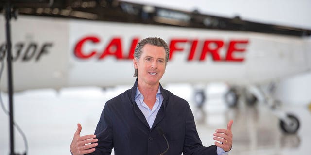 California Gov. Gavin Newsom visits the California Department of Forestry and Fire Protection's McClellan Reload Base in Sacramento, Calif.