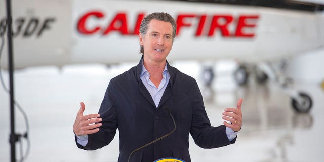 California Gov. Gavin Newsom visits the California Department of Forestry and Fire Protection's McClellan Reload Base in Sacramento, Calif.