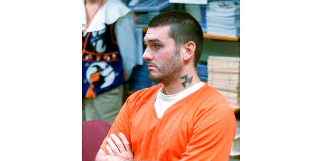 FILE: In this Oct. 31 1997 file photo Danny Lee waits for his arraignment hearing for murder in the Pope County Detention Center in Russellville, Ark. 