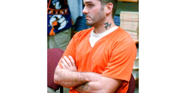 FILE: In this Oct. 31 1997 file photo Danny Lee waits for his arraignment hearing for murder in the Pope County Detention Center in Russellville, Ark.